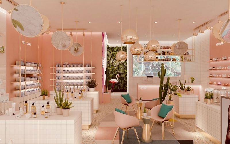 Showroom mỹ phẩm gam màu hồng đào tinh tế, kết hợp đèn thả trần
