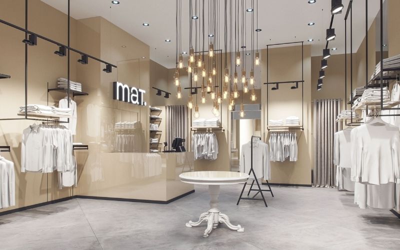 Showroom quần áo với gam màu vàng nhạt cuốn hút