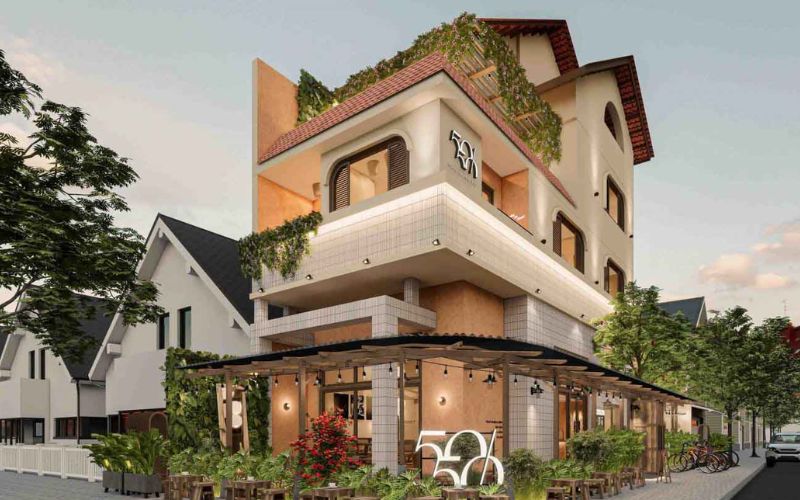 Quán cafe góc phố kiểu hiện đại màu be, kết hợp sân vườn thoáng đãng