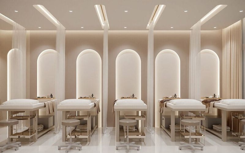 Spa massage kiểu hàn tối giản với gam màu vàng đồng thanh lịch
